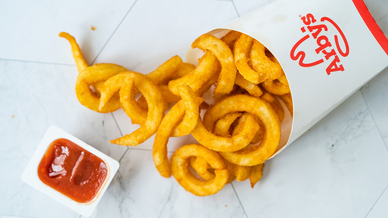 Arby's curly fries with red sauce