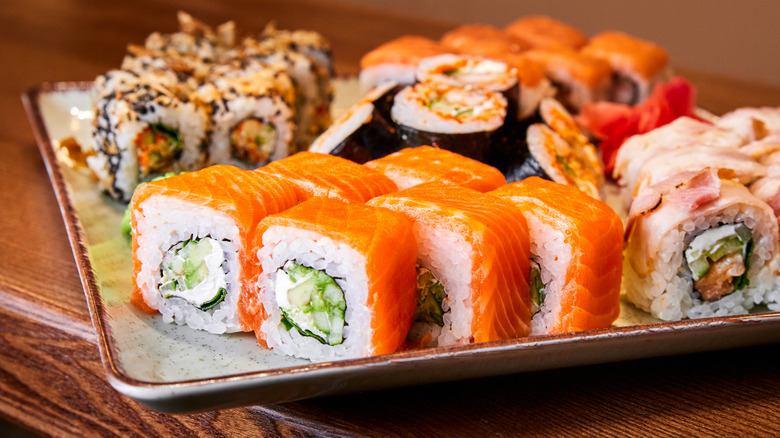 Plate holding a variety of sushi types