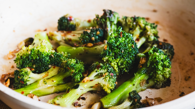 Broccoli seasoned and in a bowl