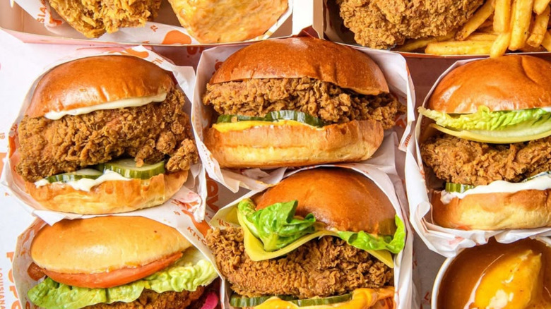 Popeyes chicken sandwiches in wrappers