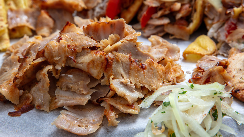 A pile of thinly sliced gyro meat.