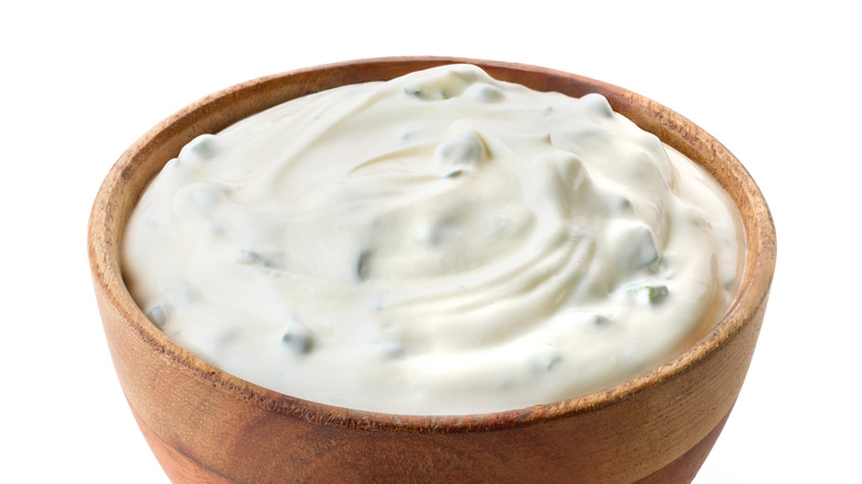 white dip in wooden bowl