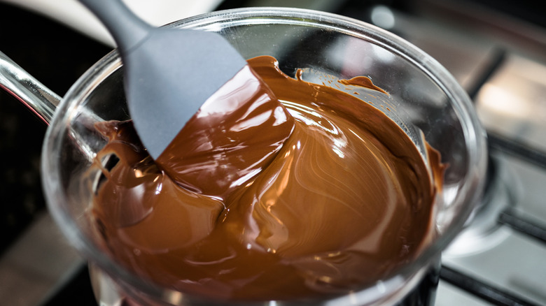 close-up view of mixing melted chocolate