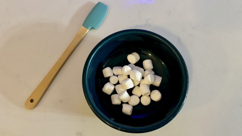 marshmallows in a bowl and a spatula
