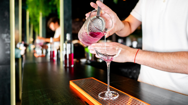 bartender prepares cocktail