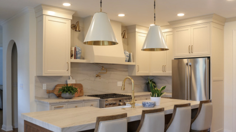 crisp modern kitchen with white cabinets