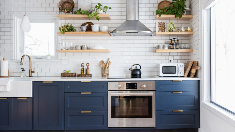 kitchen with white and bold blue hues