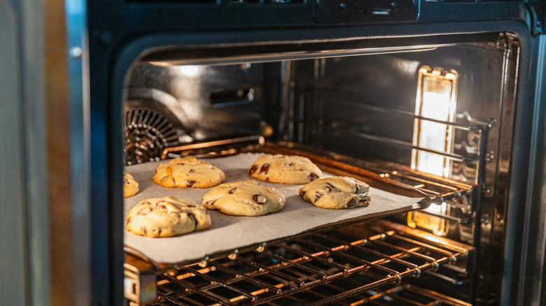 Tray of cookies in oven.