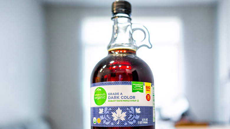 bottle of Grade A maple syrup on counter