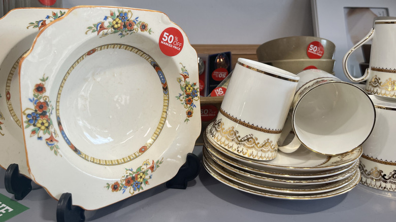 vintage ceramic dishware stacked up