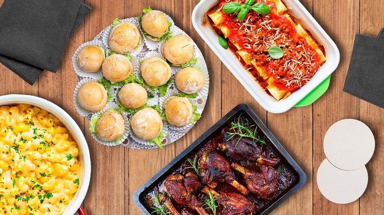 Food dishes on a table with coasters and napkins