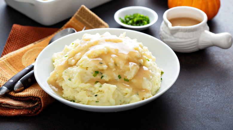 Bowl of mashed potatoes and gravy