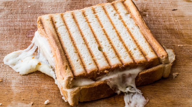 A grilled cheese with perfectly toasty bread and melting cheese can only be made better with gold flakes.