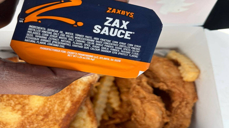 A container of Zax sauce