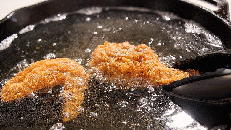 frying chicken in oil