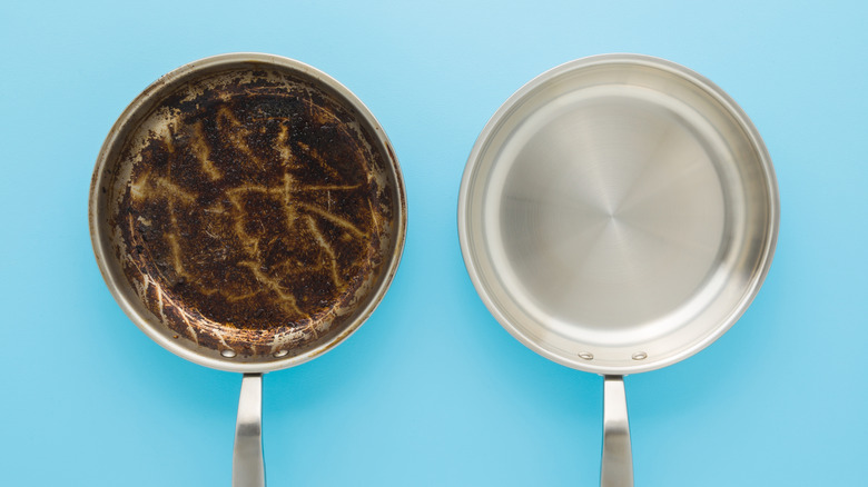 Two stainless steel pans are shown from above with one clean and the other dirty