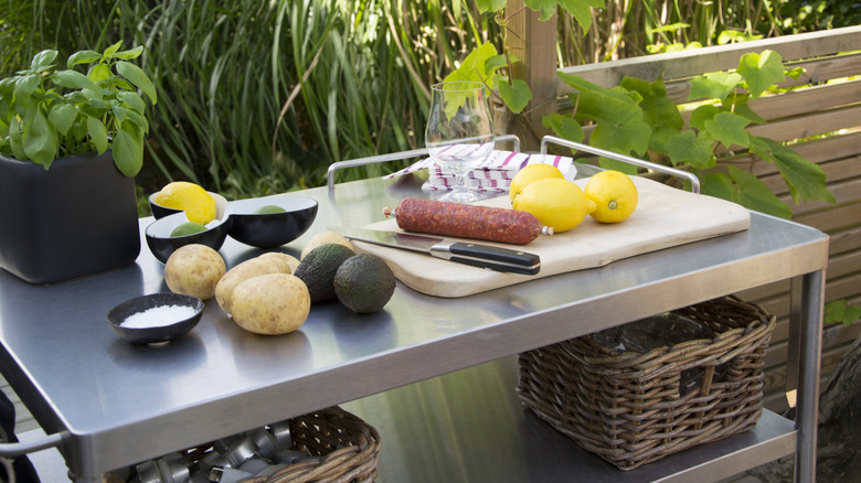Food on top of a stainless steel cart