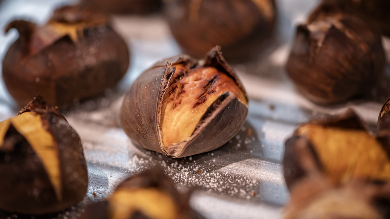 Roasted chestnuts with skin peeling back