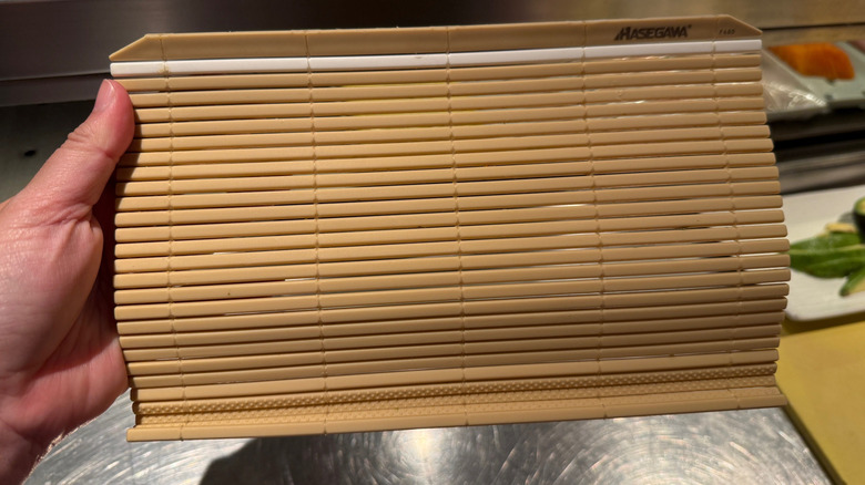 Plastic "bamboo" mat for making sushi