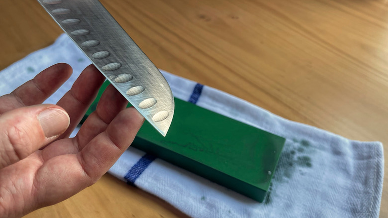 Feel for the burr on the opposite side of your knife you've been sharpening