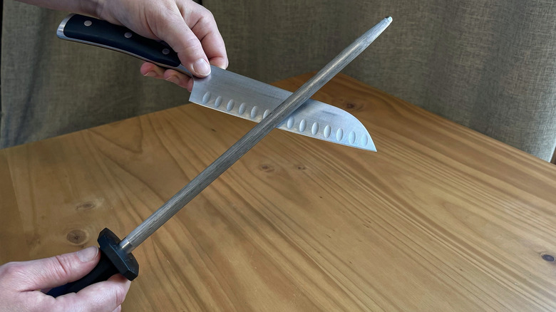 Honing a knife on a honing steel