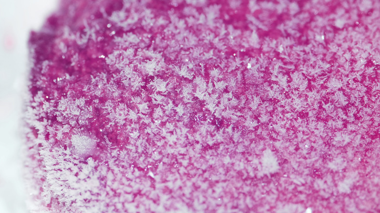 A close-up of ice crystals forming, indicating freezer burn
