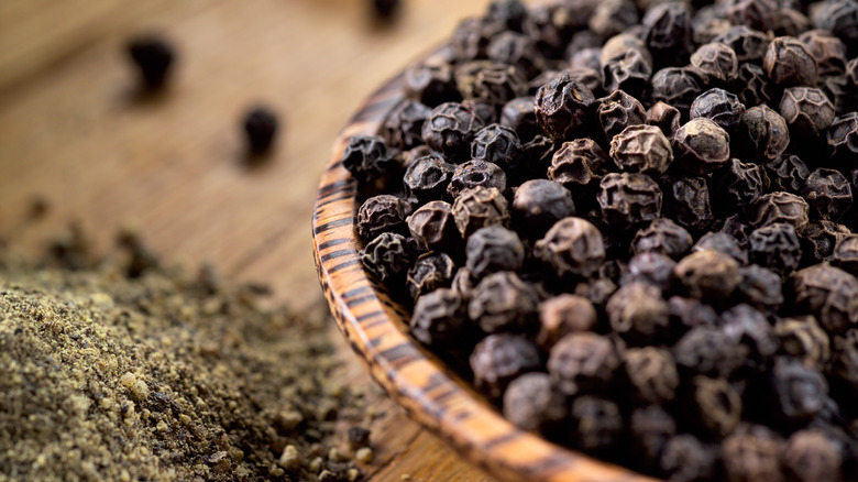 Ground black pepper and peppercorns