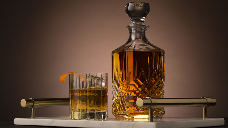 Whiskey decanter with a glass of whiskey