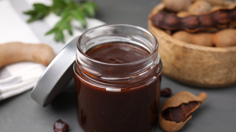 A glass jar of tamarind paste