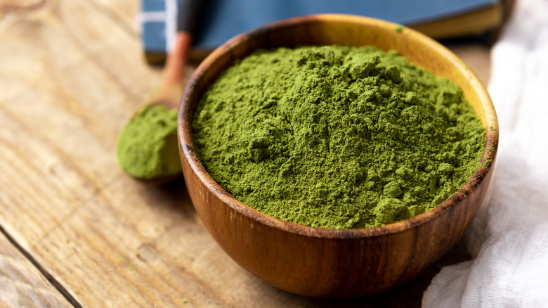 Matcha powder in a wooden bowl
