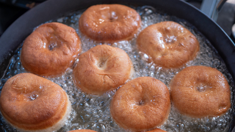 Pan of donuts frying