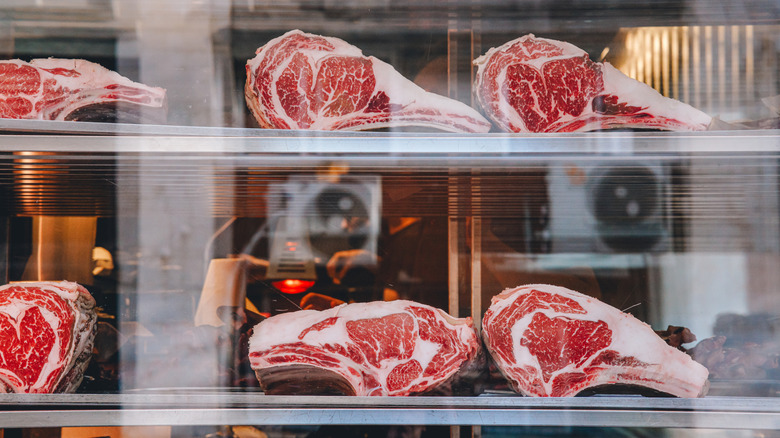 raw dry-aged beef on a shelf