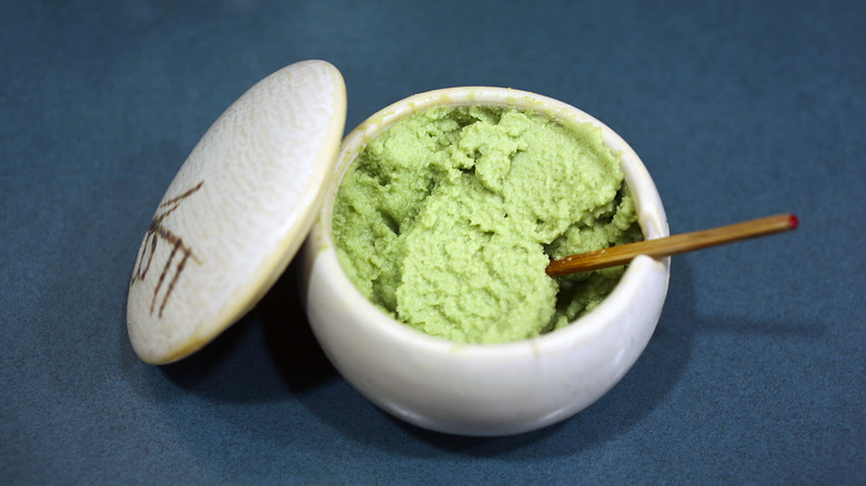 small white dish filled with wasabi