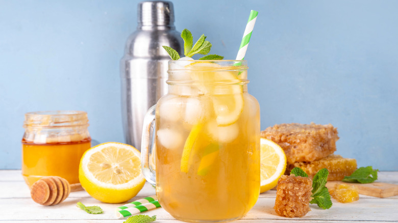 Mason jar filled with citrus fruit drink
