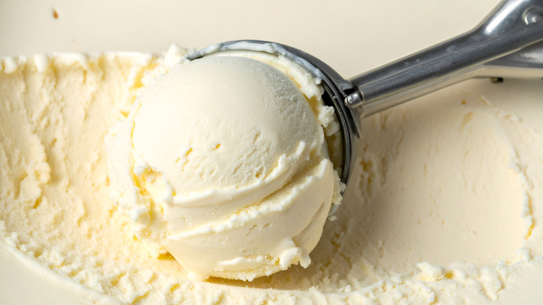 Vanilla ice cream being scooped
