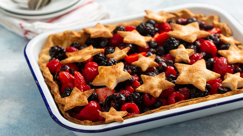 berry slab pie in an enamel baking dish
