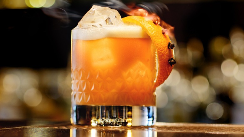 A garnished old fashioned cocktail