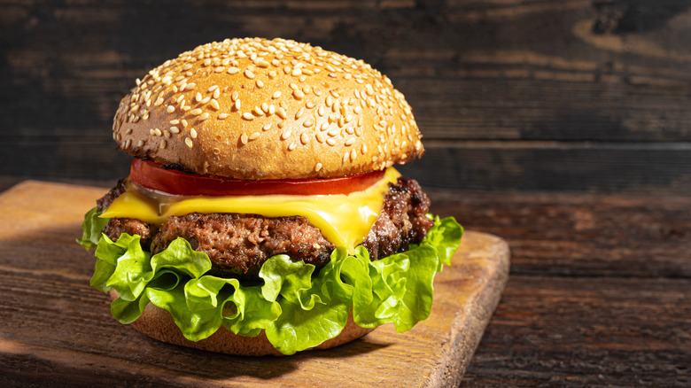 Cheeseburger on a cutting board