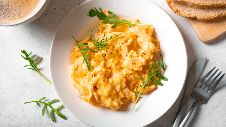 scrambled eggs on white plate