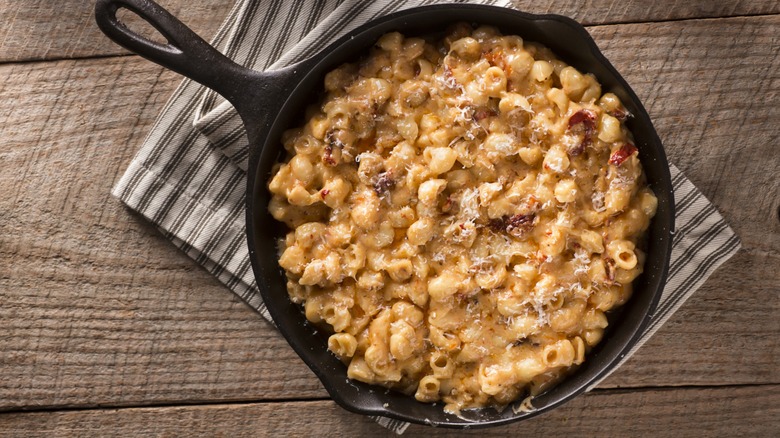 cheesy lobster pasta in skillet