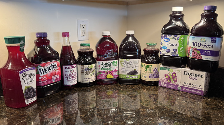Bottles of grape juice on the countertop