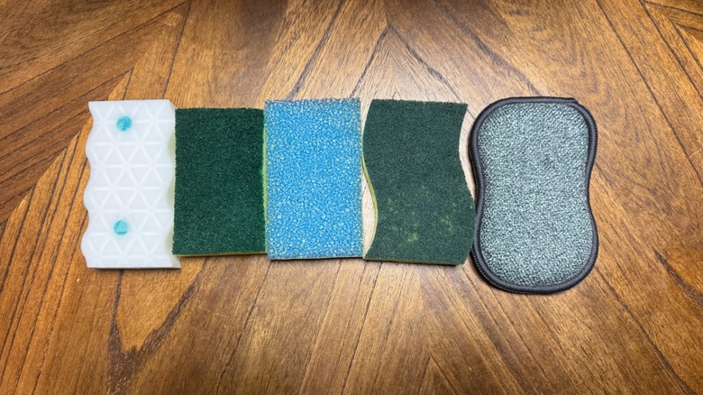 Five unwrapped sponges in a row