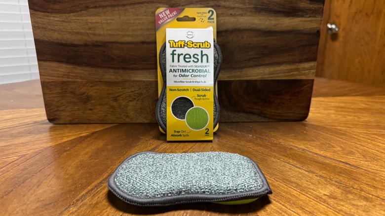 A package of Tuff-Scrub sponges with wooden background on kitchen table