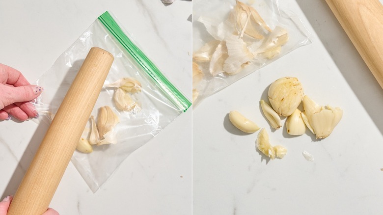 Smashing garlic cloves with a rolling pin next to the resulting peeled garlic