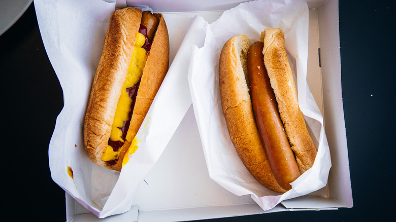 Two IKEA Hot Dogs in a cardboard box