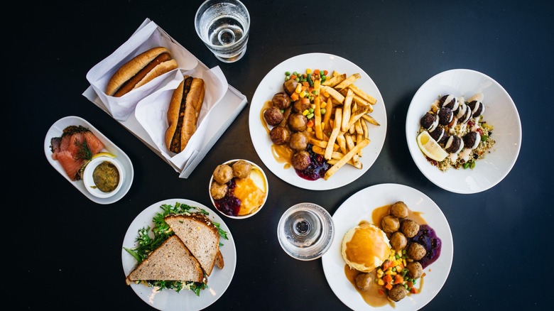 Eight IKEA dishes on a black table