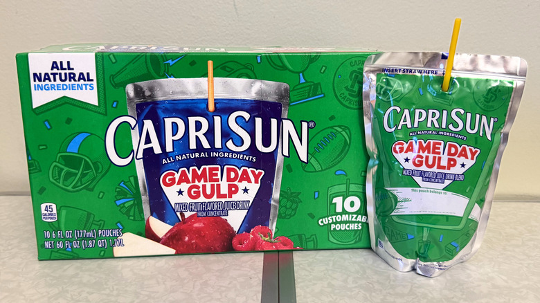 Capri Sun Game Day Gulp juice pouch beside its box