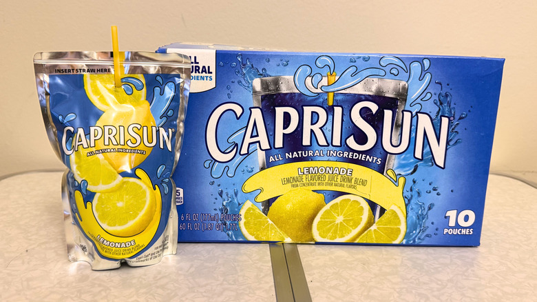 Capri Sun Lemonade juice pouch beside its box