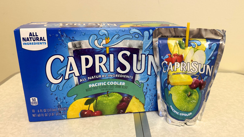 Capri Sun Pacific Cooler juice pouch beside its box