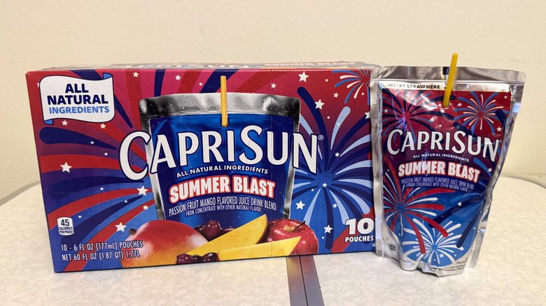 Capri Sun Summer Blast juice pouch beside its box